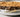 Image d'une tartine de pain et de beurre de cacahuète.