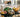 Image d'aliment (melon, saumon, banane...)contenant du potassium sur une table en verre.